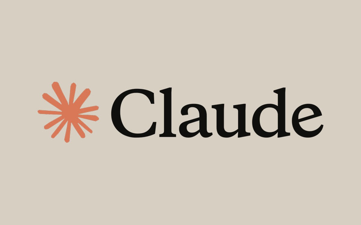 Claude wordmark and orange sunburst on a warm neutral background