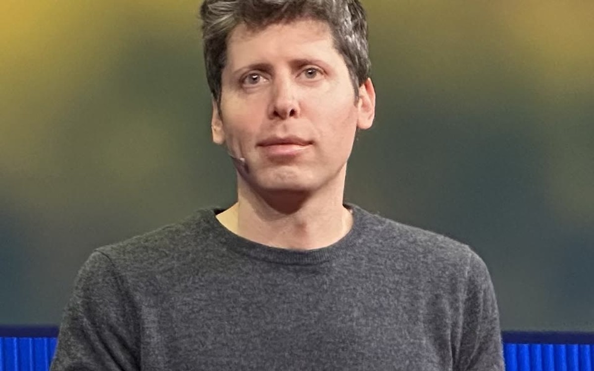 OpenAI chief executive Sam Altman speaking onstage at TED